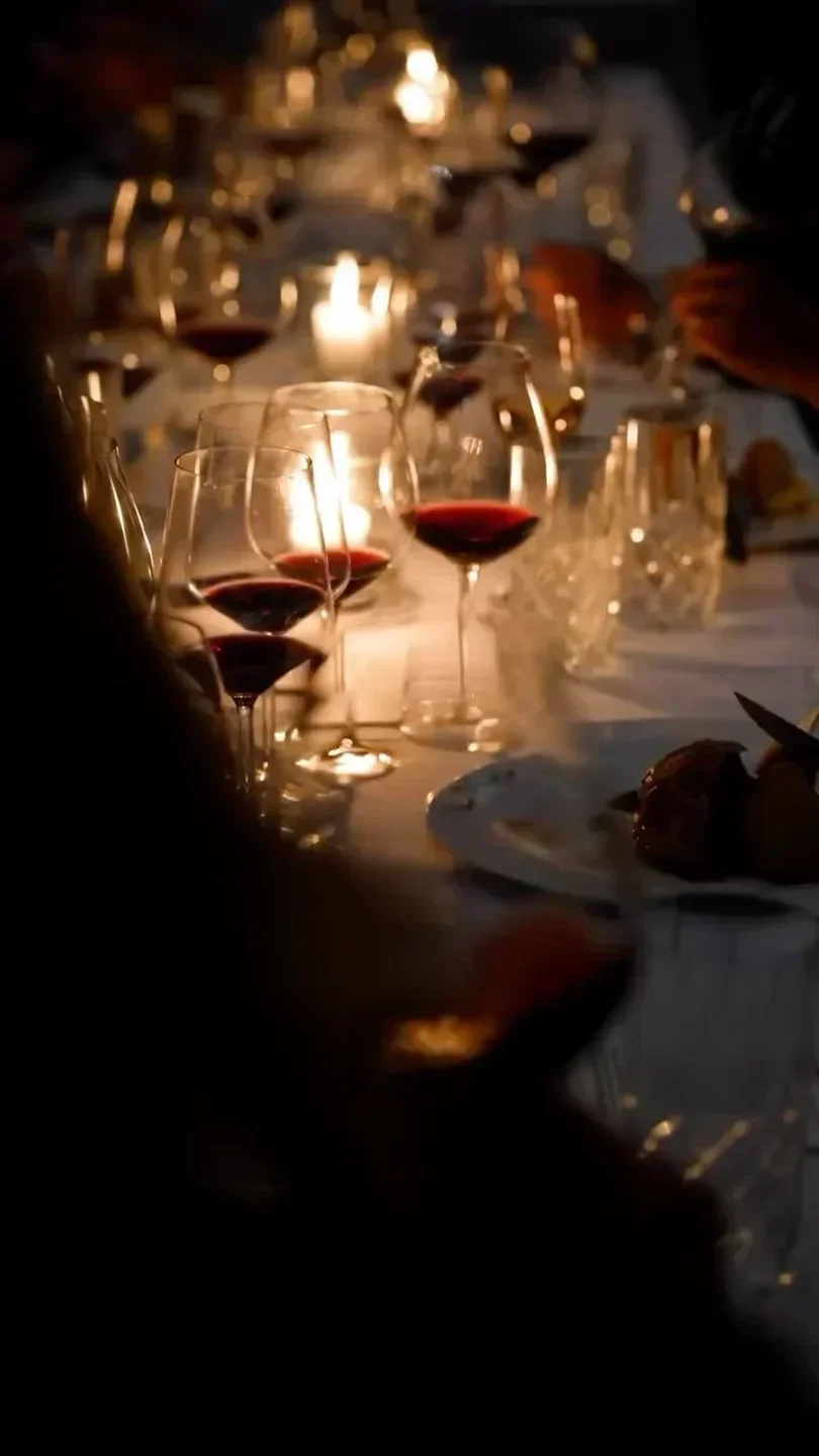 Candlelit dinner at Casa D'Angelo - Aventura, Miami, with glasses of red wine.