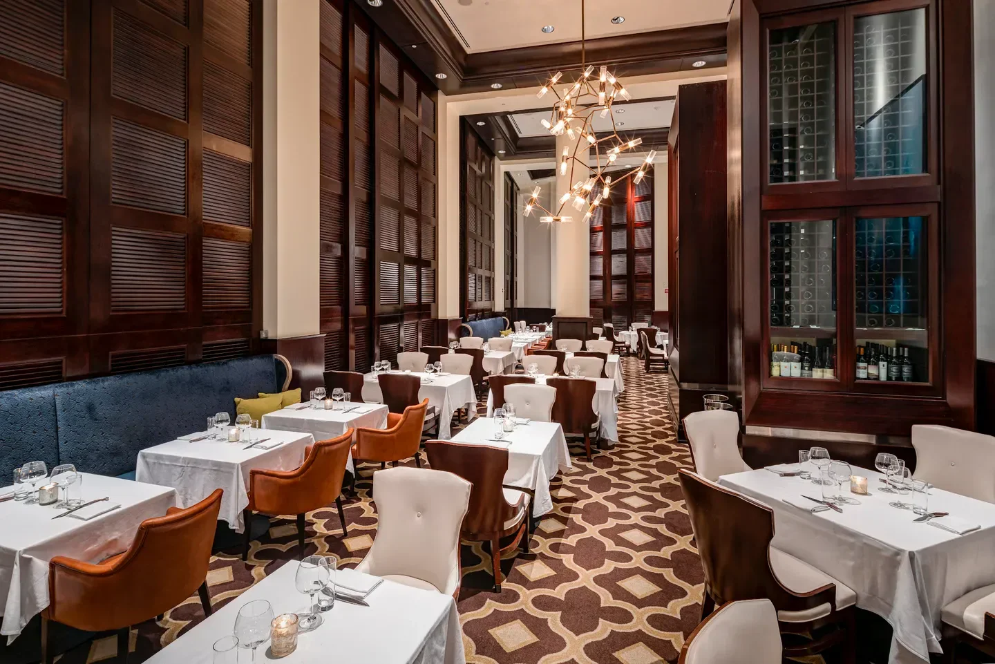 Interior dining at Diplomat Prime in Miami, featuring tables and elegant decor.