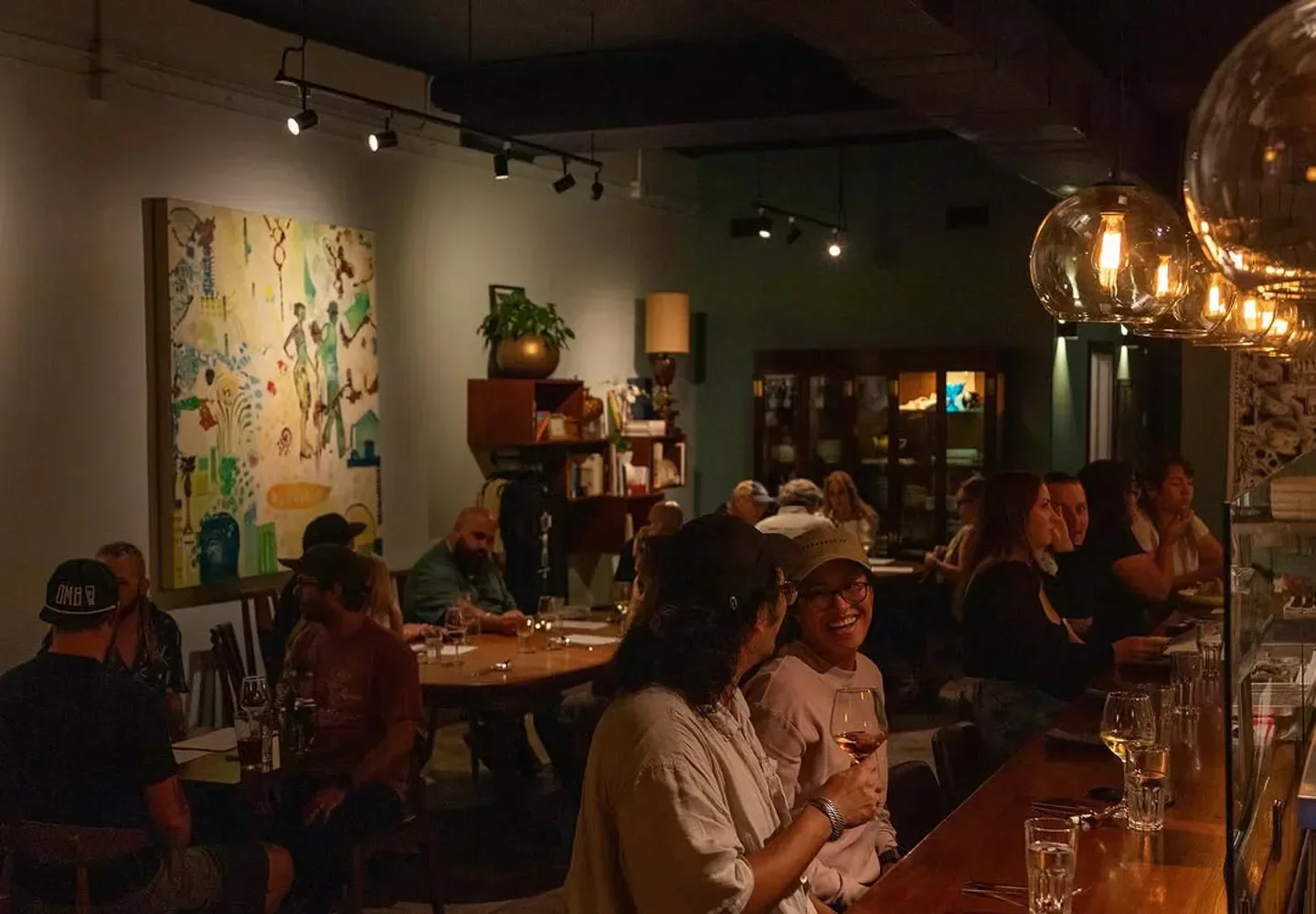 Enjoying the ambiance at EntreNos restaurant in Miami with friends and good wine