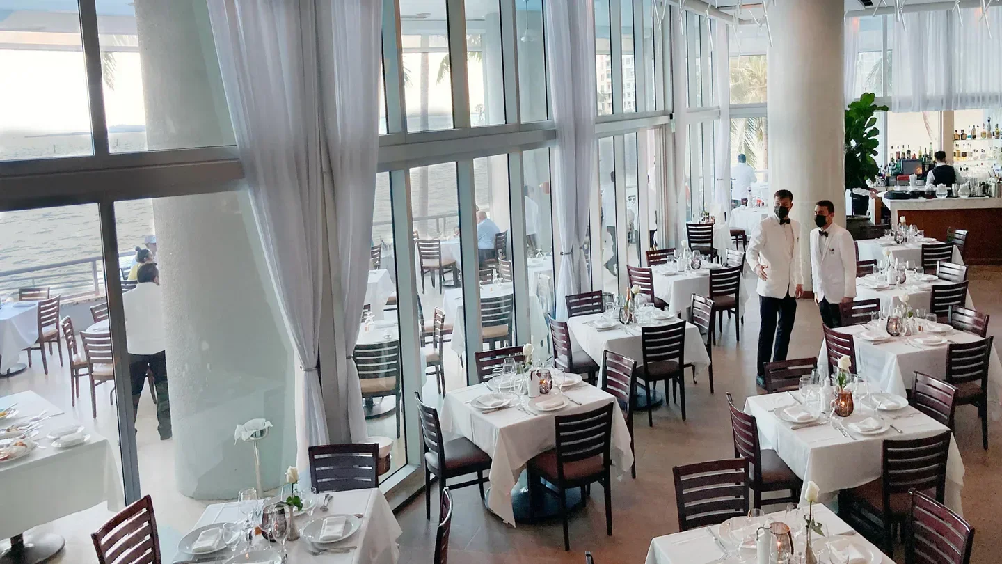 Inside Il Gabbiano in Miami: Elegant restaurant with waterfront views and attentive service.