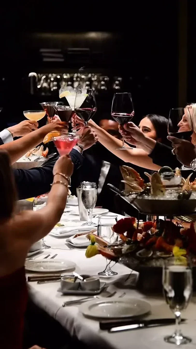Cheers at Mastro's Ocean Club - Miami: Fine dining in Miami with friends and seafood.