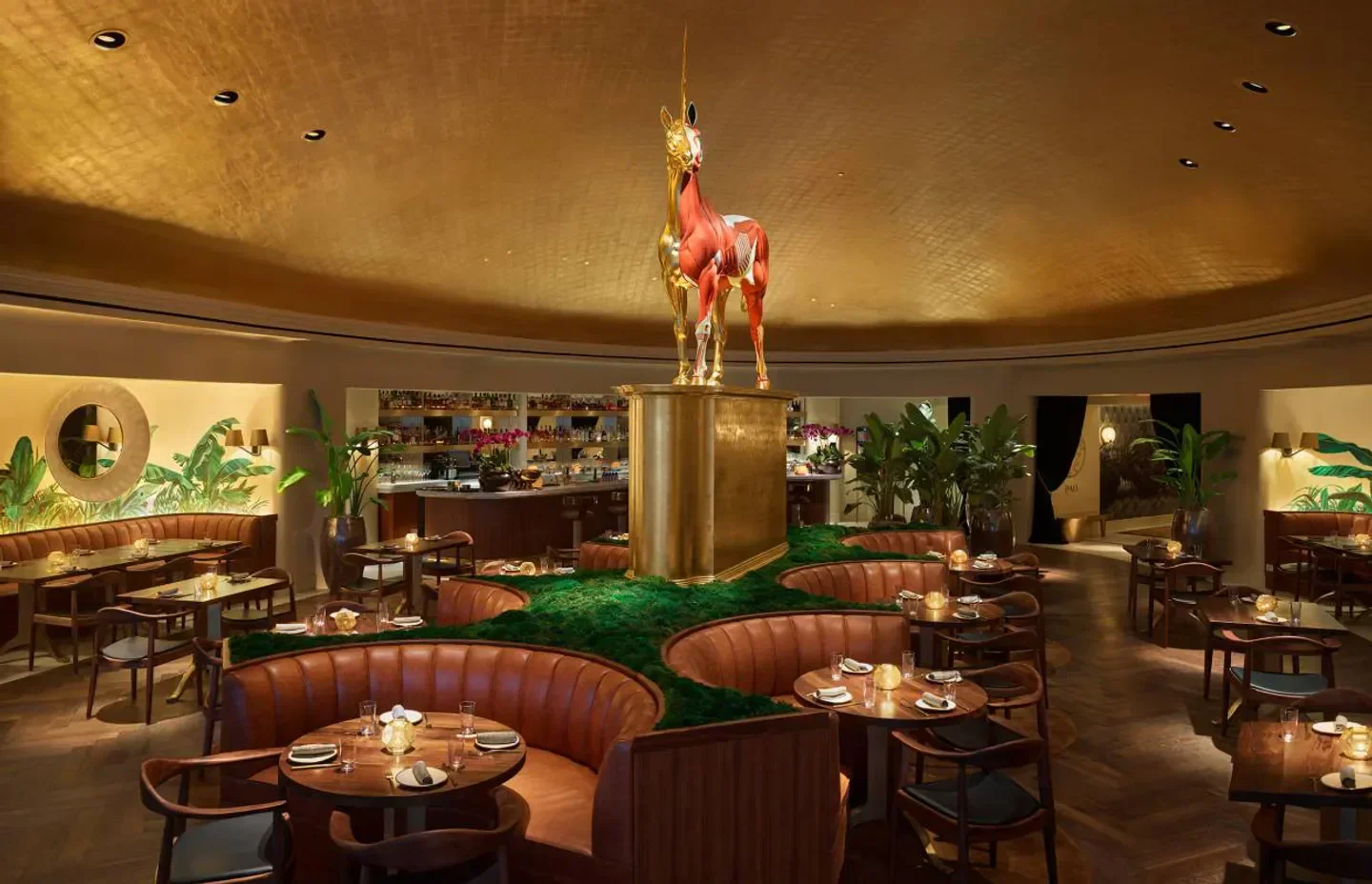 Interior of Pao by Paul Qui, Miami restaurant, featuring a unique unicorn statue.