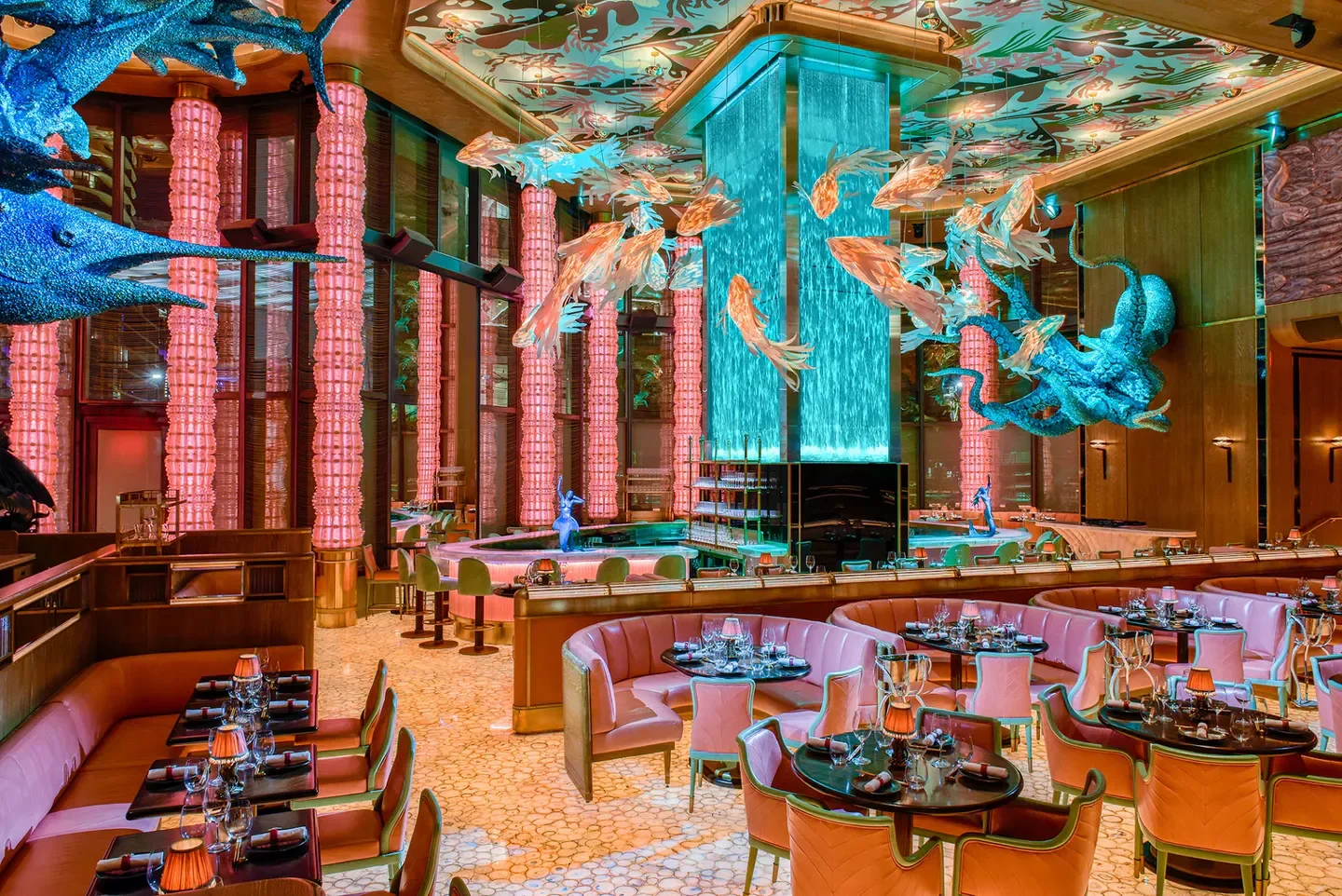 Stunning interior of Sexy Fish Miami restaurant with decorative fish sculptures in Miami.