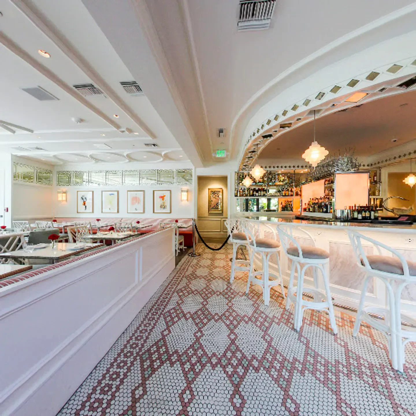 Interior of Swan restaurant in Miami, featuring a stylish bar and mosaic floor.