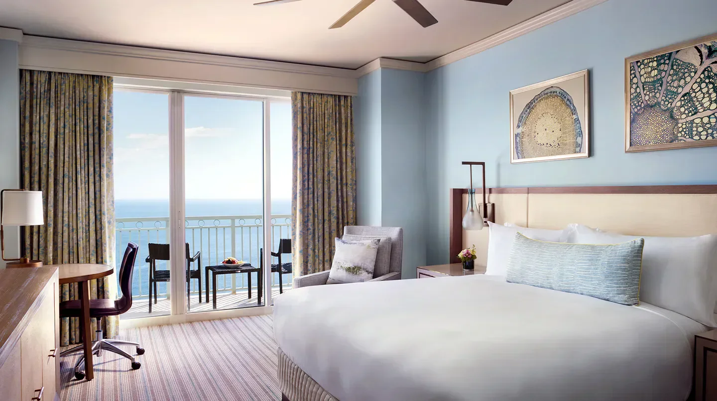 Spacious bedroom at The Ritz-Carlton Key Biscayne, Miami with ocean view from balcony