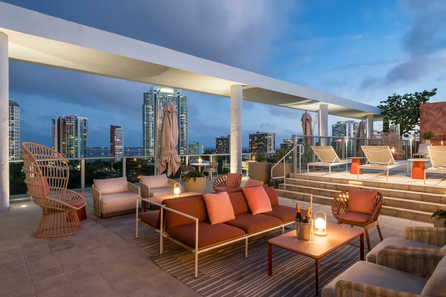 Rooftop lounge at Vista restaurant in Miami, with city skyline views at dusk.
