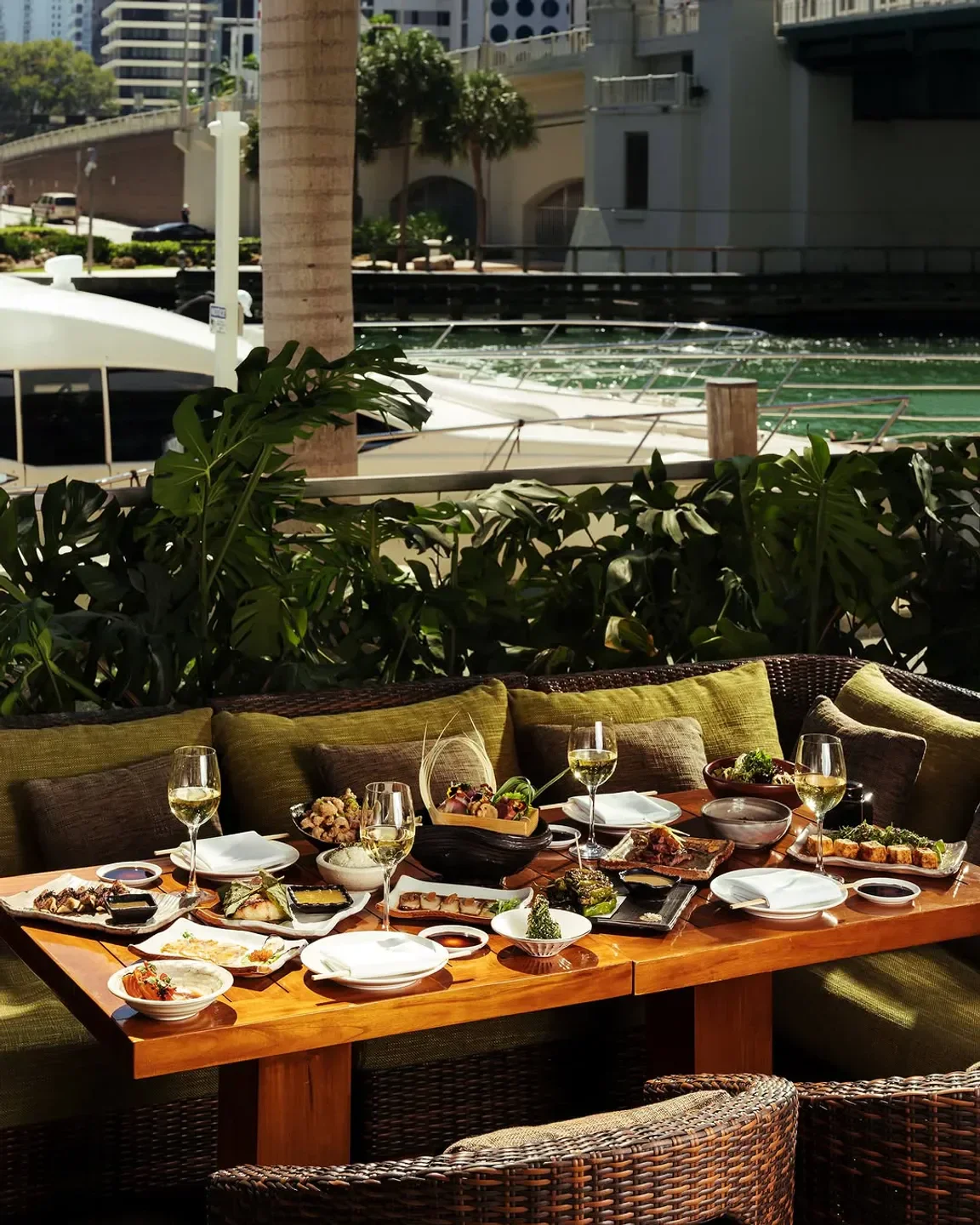 Delicious spread on the terrace at Zuma Miami, waterfront dining experience.